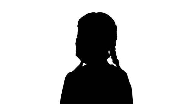 Medium shot. Front view. Close up. Silhouette Little girl wearing protective face mask taking deep breaths looking at camera. Professional shot in 4K resolution. 060. You can use it e.g. in your medical, commercial video, business, presentation, broadcast