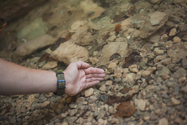 istock Exploring the mountains waterfall and enjoying in nature 1275677950