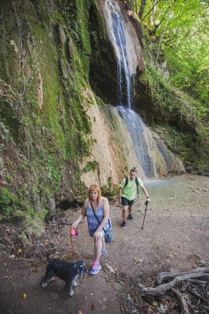 istock Exploring the mountains waterfall and enjoying in nature 1275678499