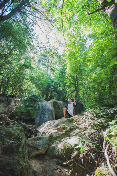 istock Exploring the mountains waterfall and enjoying in nature 1275678675