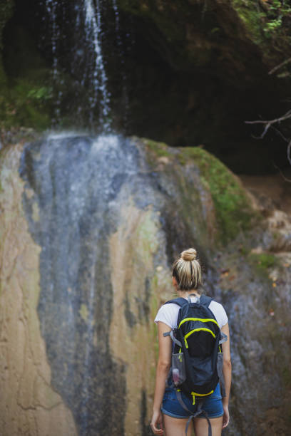 istock Exploring the mountains waterfall and enjoying in nature 1275678799