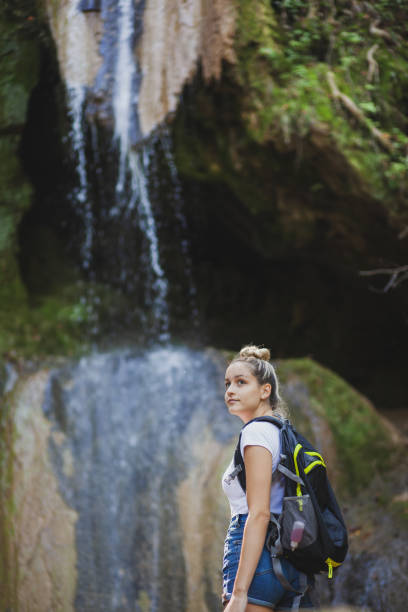 istock Exploring the mountains waterfall and enjoying in nature 1275678804