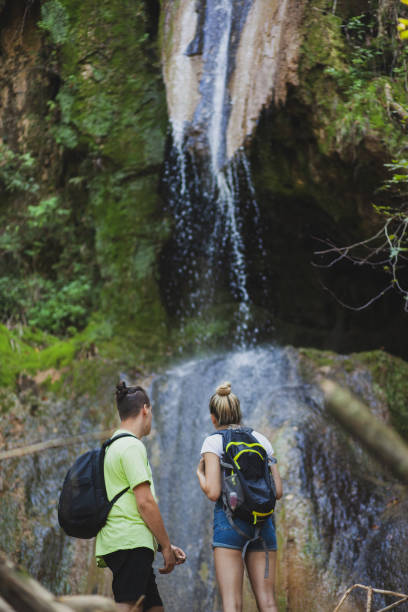 istock Exploring the mountains waterfall and enjoying in nature 1275679350