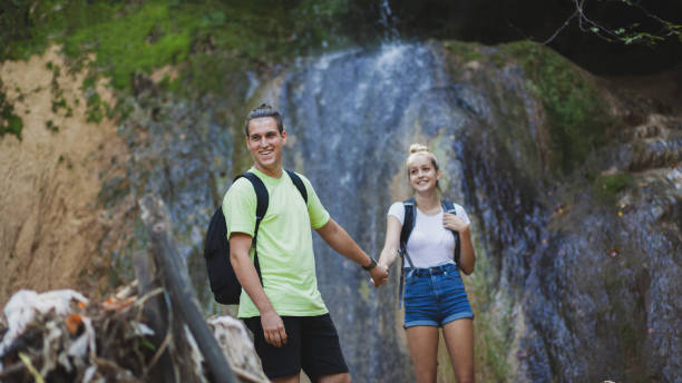 istock Exploring the mountains waterfall and enjoying in nature 1275679353