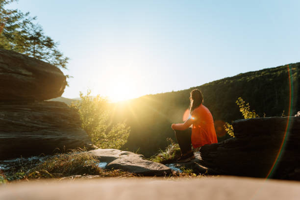 istock Friends hiking on the mountain with waterfall 1275679733