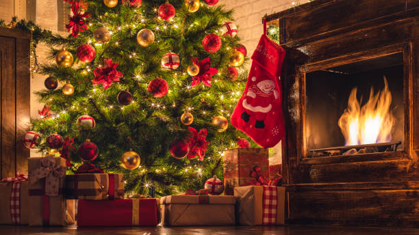 istock Decorated Christmas Tree Near Fireplace at Home 1275681154