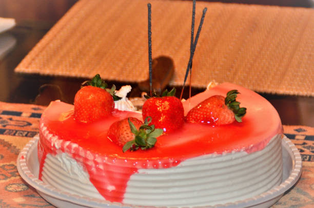 istock A whipped cream cake with fruit and strawberry syrup 1275685693