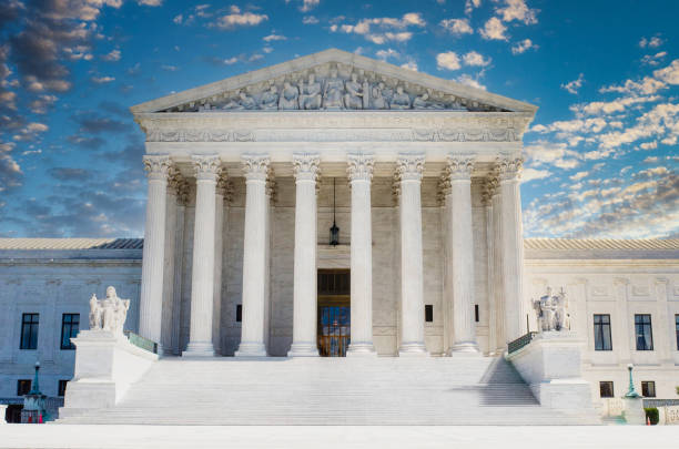 istock Supreme Court in Washington DC with dark storm clouds. 1275708808