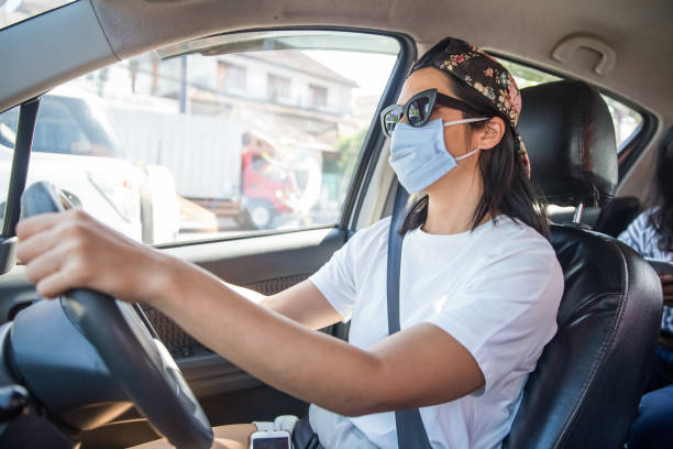 istock Rideshare driver taking passenger to work during COVID-19 1275708836