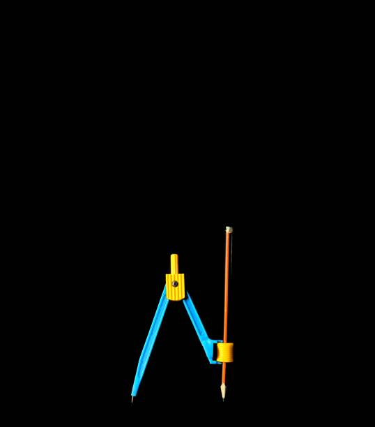 istock Plastic compass with pencil to draw circles on a black background. creative concept 1275712669