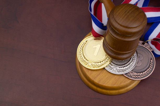 istock Medals and wooden judge's gavel with copy space 1275712840