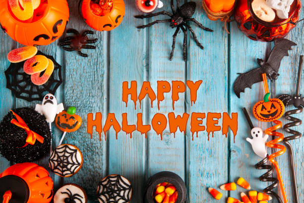 istock Halloween party decorations frame on blue wooden rustic table 1275723814