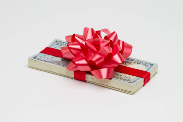 istock 100 Dollar Cash Prize Red Ribbon 1275730672