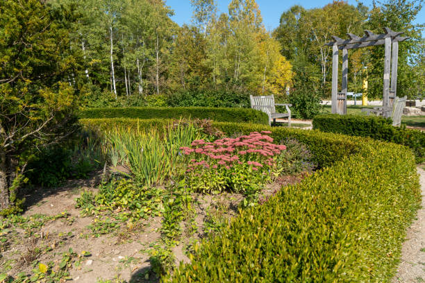 Rock stairway leading to a garden with decorative urn\ncan't be blank