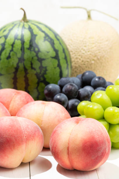 istock Summer fruits on a white board. 1275744990