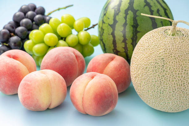 istock Summer fruits on light blue background. 1275744993