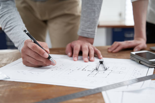 istock Japanese architects at a casual office meeting 1275745893