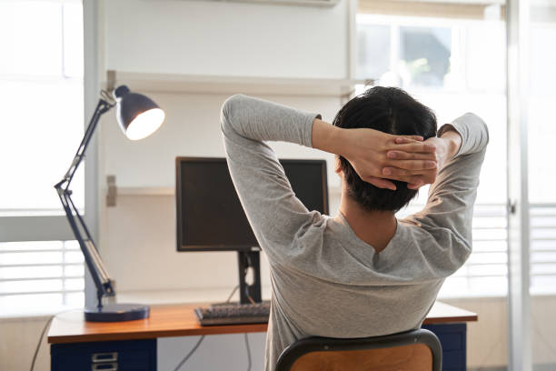 istock A Japanese male businessman in plain clothes taking a break from working from home 1275745982