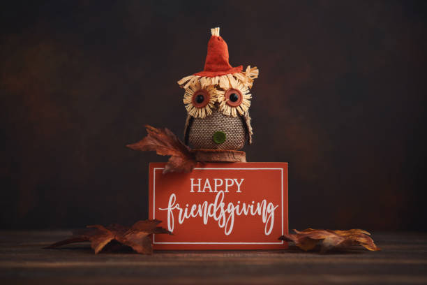 istock Fall background with rustic owl and Happy Friendsgiving Sign 1275746074