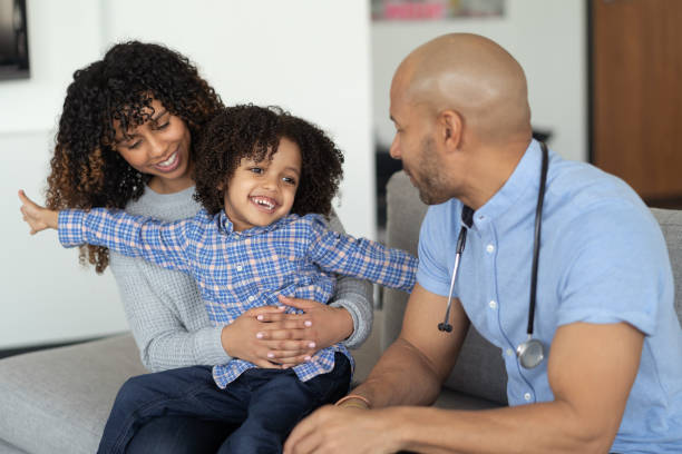 istock Nurse visits young child in home 1275749191