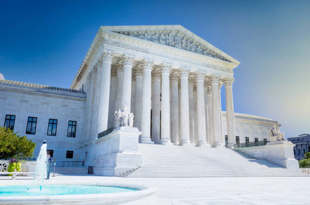 istock Supreme Court in Washington DC with dark storm clouds. 1275758273