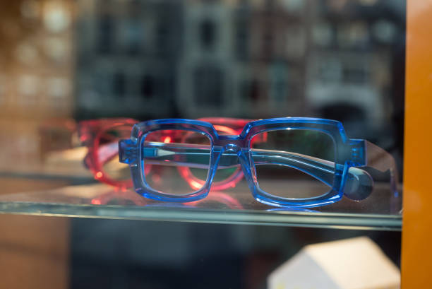 istock plastic eye glasses in a optician store showrooom 1275760747