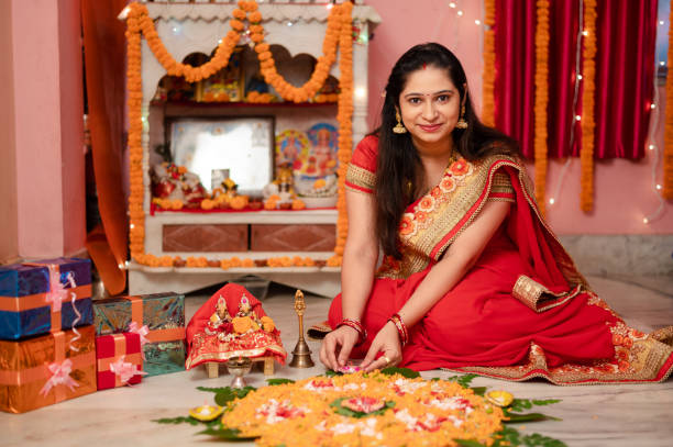 istock Indian woman celebrating Diwali 1275760775