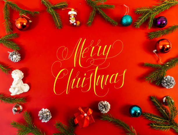 istock Christmas card, banner, flatlay with text - Merry Christmas on a red background 1275765835