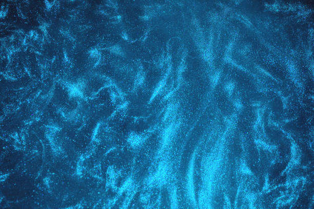 istock Abstract dark blue glitter shimmering holiday background 1275772072