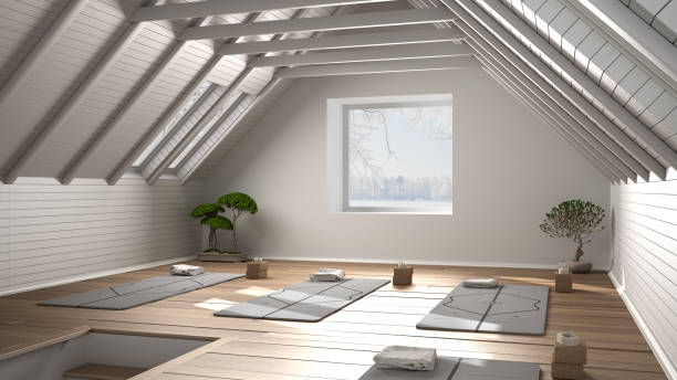 istock Empty yoga studio interior design, minimal open space with bonsai, mats and accessories, wooden floor and roof, ready for yoga practice, meditation, square window with winter panorama 1275772522
