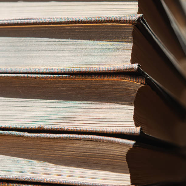 istock stack of old books for reading lies on the table in the room. 1275778706