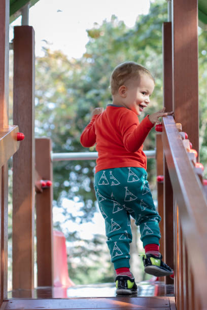 istock Little Boy Playing at Playground 1275779324