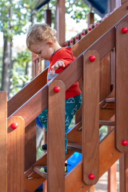 istock Little Boy Playing at Playground 1275780491