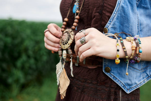 istock Hippie women relaxing on field 1275781039