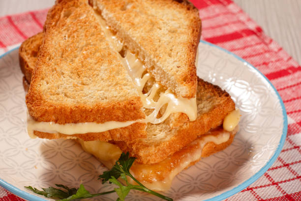 istock Good food for breakfast. Toast with butter and cheese. 1275781973