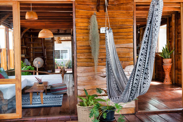 Luxury wooden log cabin with indoor hammock