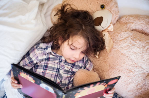 istock Boy with his favorite picture book 1275783672