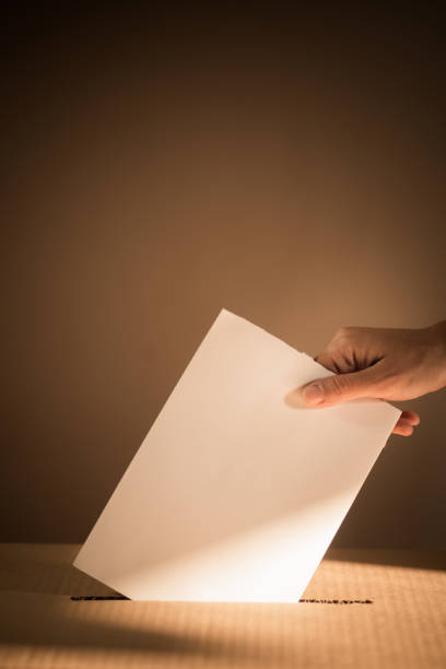 istock Conceptual image of a person voting during elections 1275785212