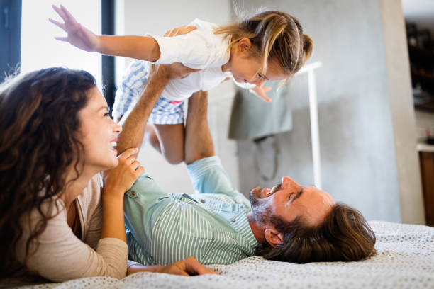 istock Happy family having fun times at home 1275785402