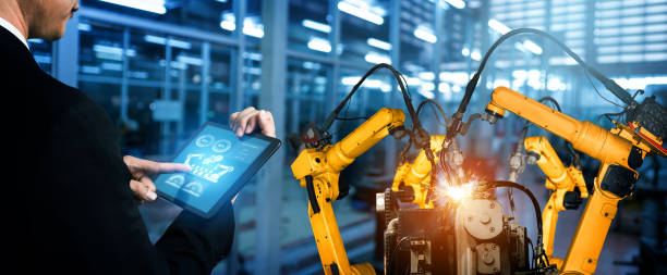 istock Smart industry robot arms for digital factory production technology 1275786879