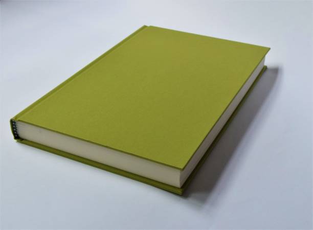 istock Green hardcover book on white background 1275787139