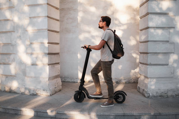 istock fun driving electric scooter through the city 1275791469