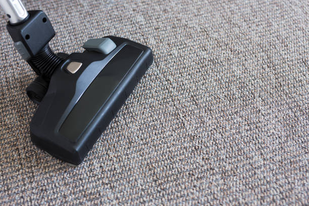 istock close up of vacuum cleaner over carpet 1275792743
