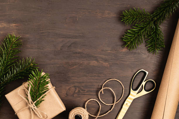 istock Christmas background with handmade gifts wrapping, presents on rustic wooden table 1275793190