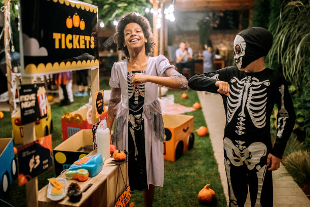 istock COVID-19 alternative handshakes on Halloween party 1275794295