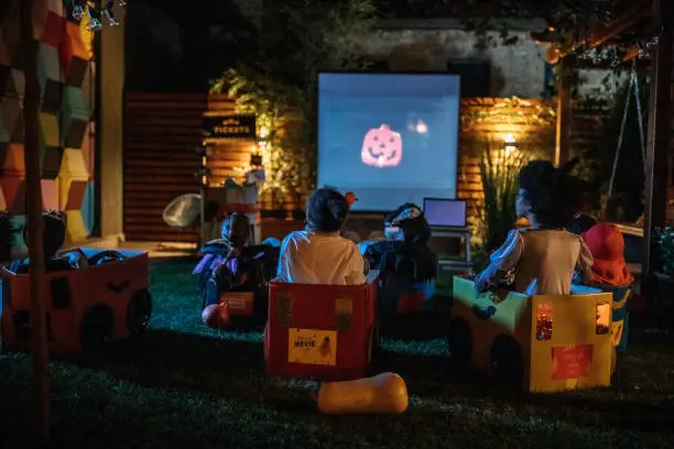 Group of children at backyard movie night