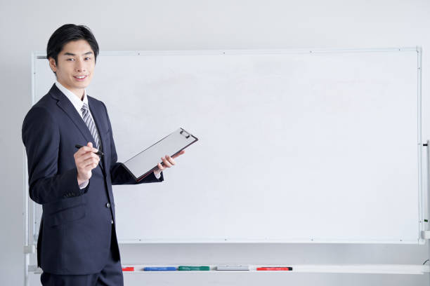 istock A Japanese male businessman presenting with confidence 1275794605