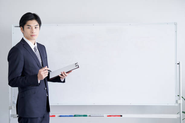 istock A Japanese male businessman presenting with confidence 1275794891