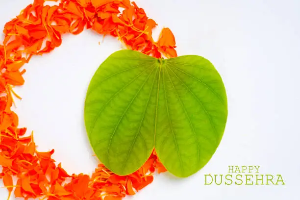 Photo of Indian festival dussehra , green leaf, rice and flowers