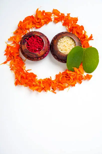 Photo of Indian festival dussehra , green leaf, rice and flowers